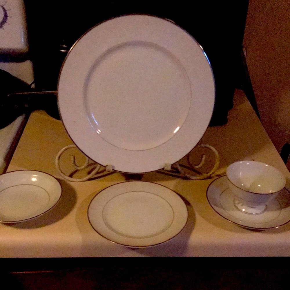 Four place setting fine China by Fashion Royale